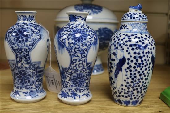 A Chinese blue and white bowl, liner and cover and three vases